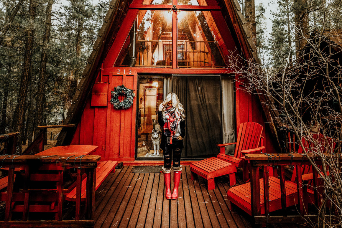 Red A-Frame Cabin with Girl in Hunter Red Boots Big Bear Rental California