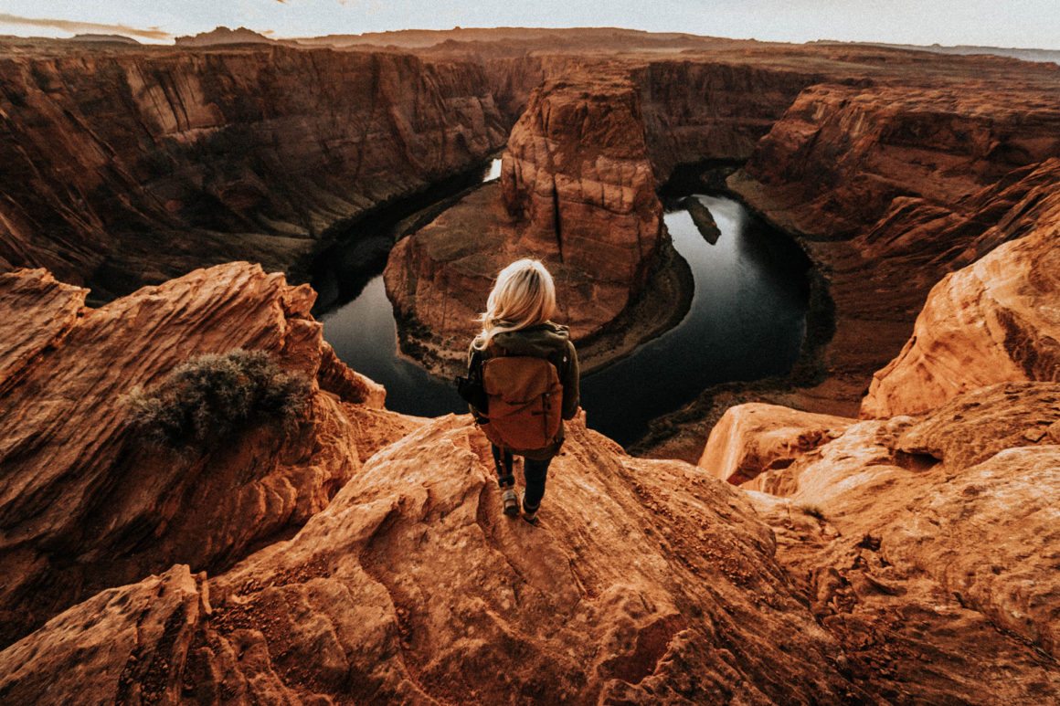 Girl on Edge at Horshoebend Page Arizona Sunset