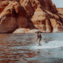 Guy wakeboarding on Lake Powell in Page Arizona